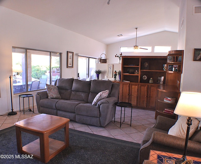 tiled living room with vaulted ceiling and ceiling fan