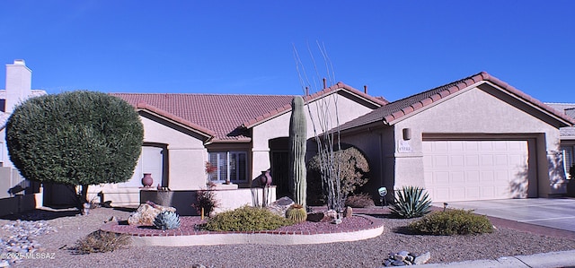 ranch-style house featuring a garage