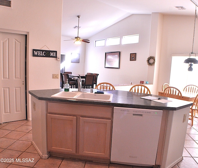 kitchen with white dishwasher, ceiling fan, a center island with sink, and sink