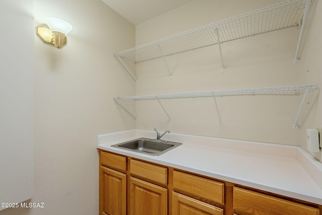 laundry area featuring sink