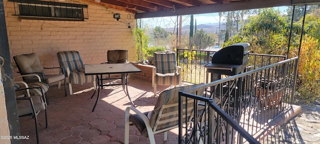 view of patio / terrace with a mountain view