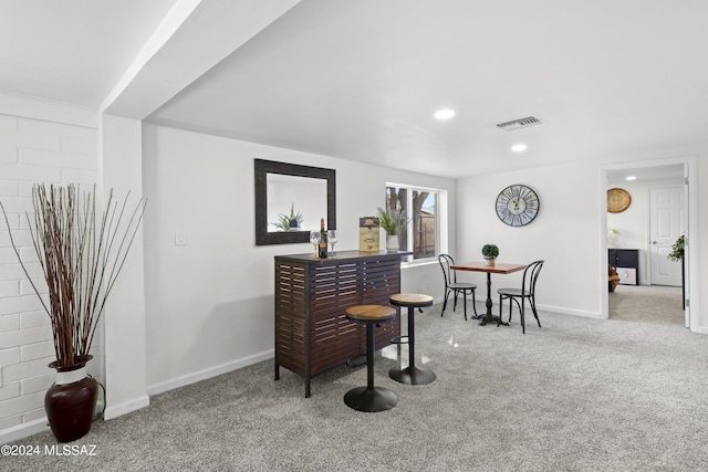 bar with light colored carpet