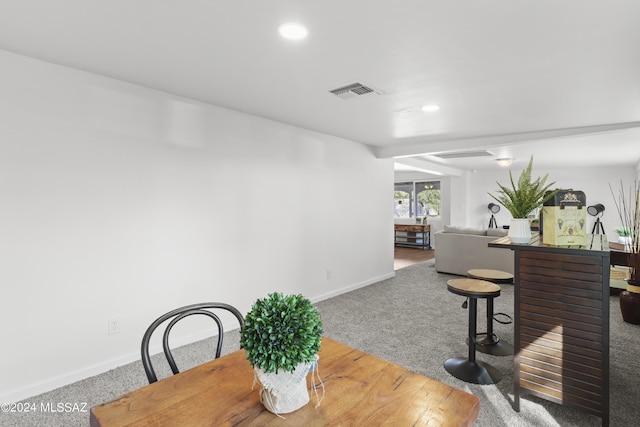 dining space with carpet floors