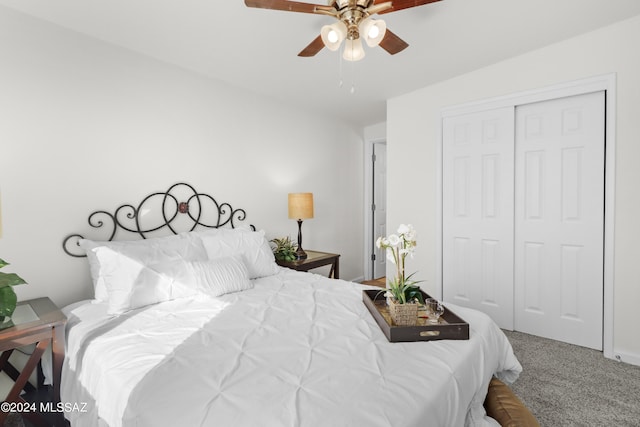 bedroom featuring carpet flooring, ceiling fan, and a closet