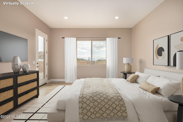bedroom featuring light wood-style floors, baseboards, access to outside, and recessed lighting