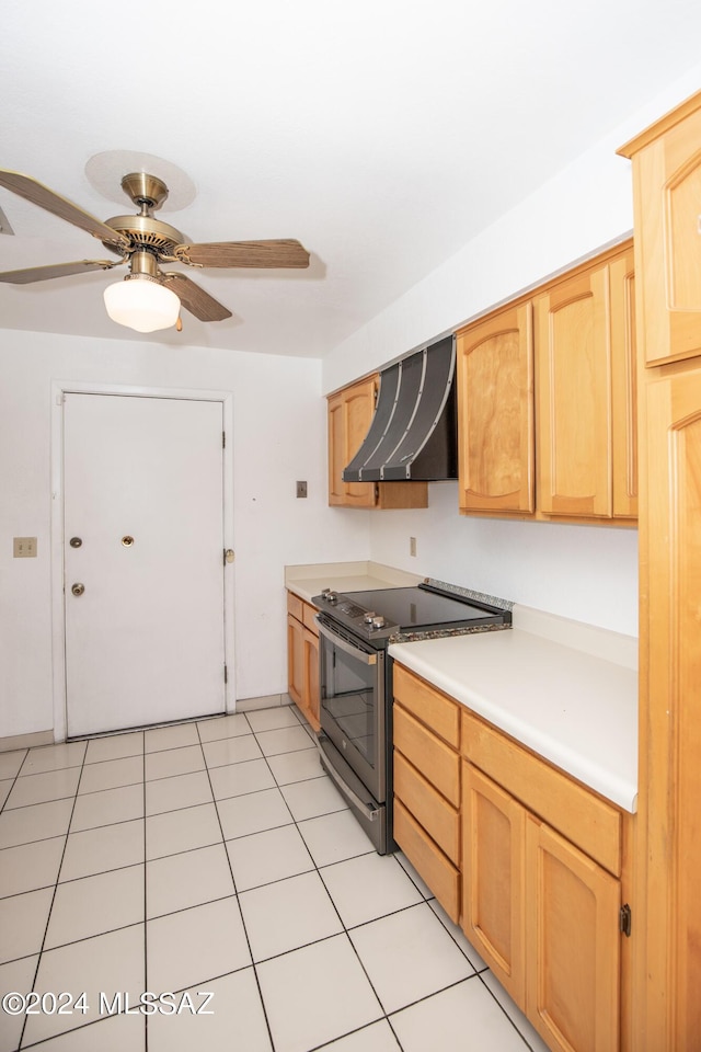 kitchen with light brown cabinetry, extractor fan, ceiling fan, electric stove, and light tile patterned floors