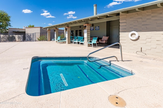 view of pool featuring a patio