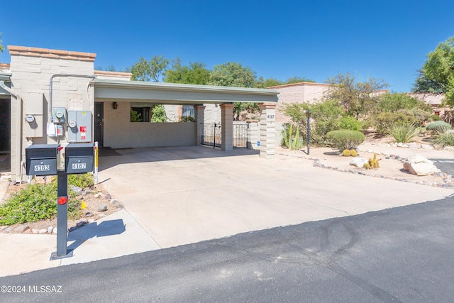 view of front of home featuring a carport