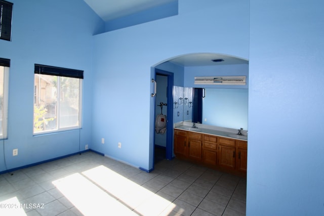 bathroom with tile patterned flooring and sink