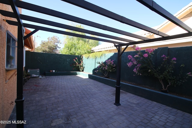 view of patio with a fenced backyard, central AC unit, and a pergola