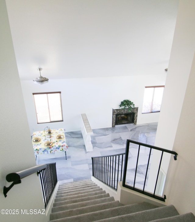 stairs with a fireplace