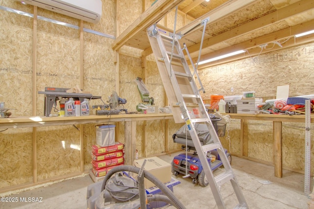 storage room with an AC wall unit