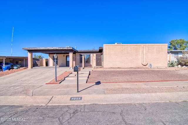 view of front of property with a carport