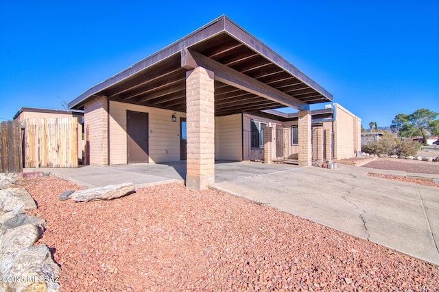 exterior space featuring a carport