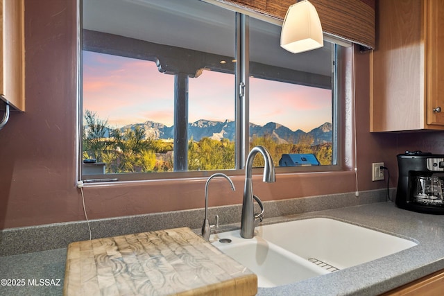 kitchen with sink and a mountain view