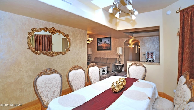 dining room with hardwood / wood-style flooring