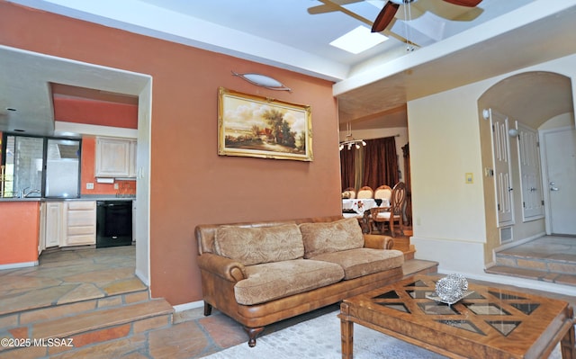 living room with ceiling fan