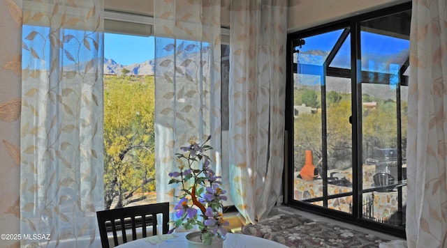 dining area featuring a mountain view