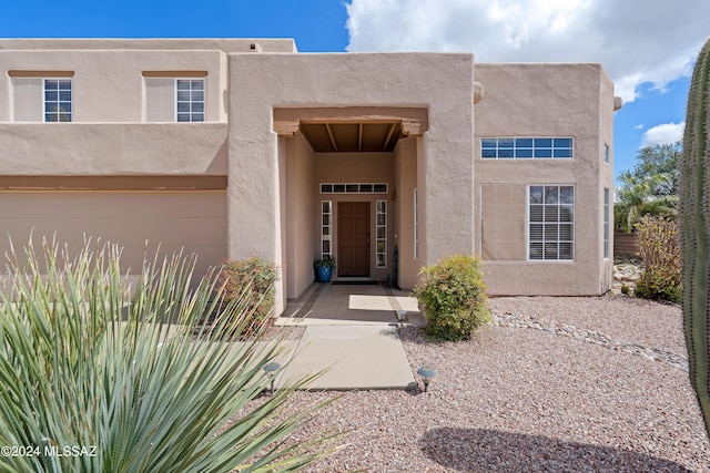 property entrance featuring a garage