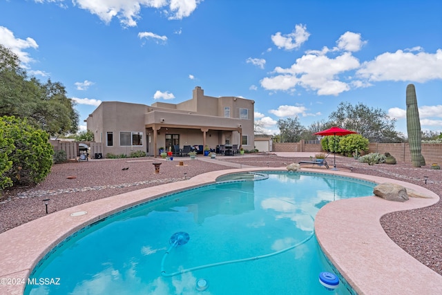 view of pool featuring a patio area