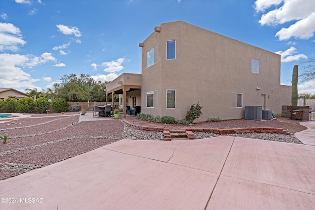 back of house featuring a patio and central AC