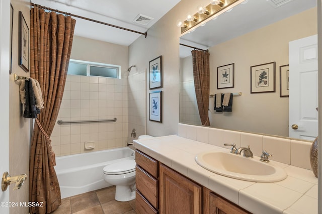 full bathroom featuring vanity, toilet, and shower / bath combo with shower curtain