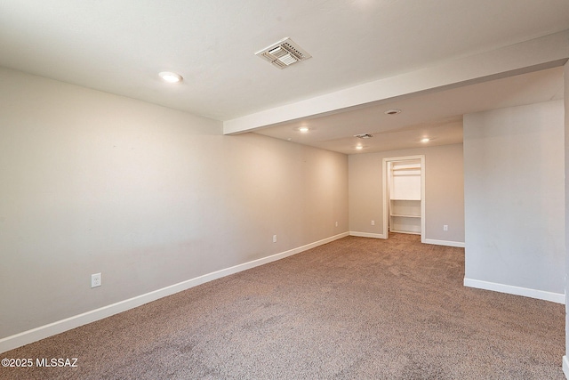 spare room featuring carpet floors