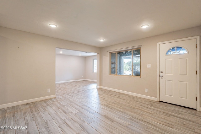 foyer with light hardwood / wood-style flooring