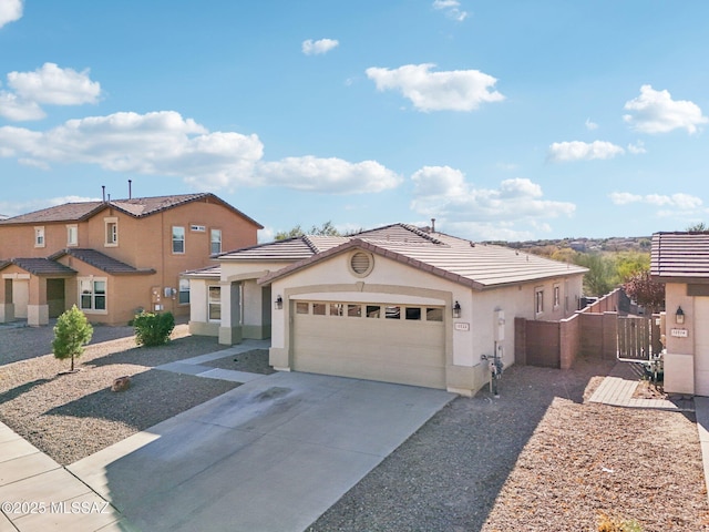 view of front of property with a garage