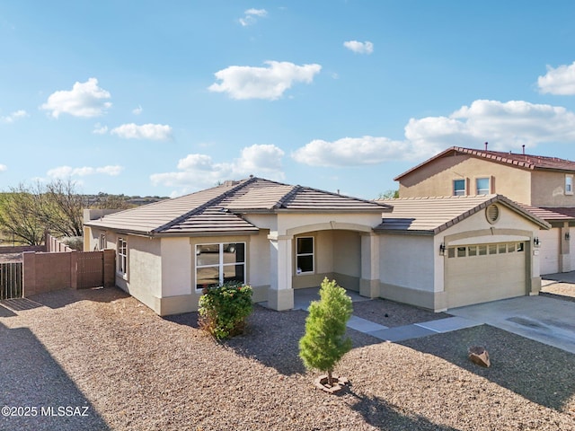 view of front of property with a garage