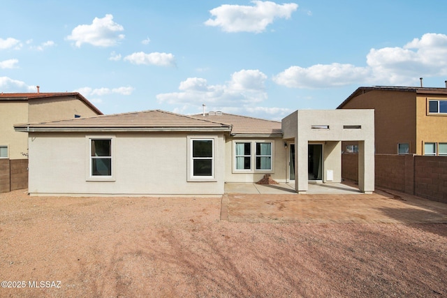 rear view of property with a patio