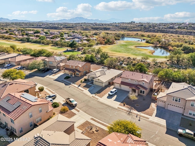 bird's eye view featuring a water and mountain view