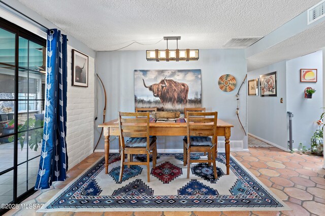 kitchen with appliances with stainless steel finishes, a breakfast bar area, wooden counters, wall chimney exhaust hood, and blue cabinets