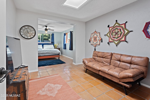 bedroom with tile patterned floors and a textured ceiling