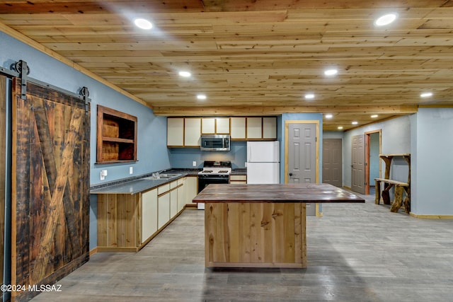 kitchen featuring light wood-type flooring, white appliances, sink, a barn door, and wooden ceiling