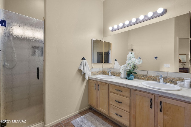 bathroom featuring vanity, tile patterned floors, and walk in shower