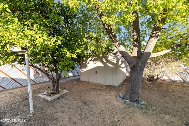 view of home's exterior featuring a shed