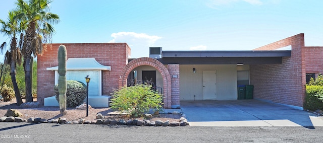 view of front of house featuring a carport