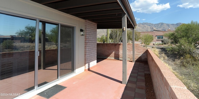 view of patio with a mountain view