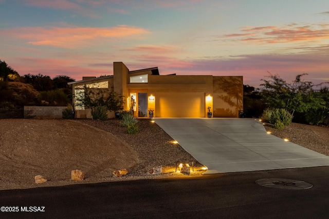 view of front of property with a garage