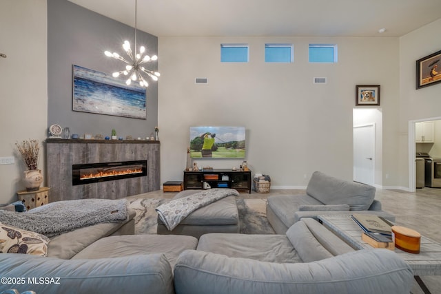 living room with an inviting chandelier