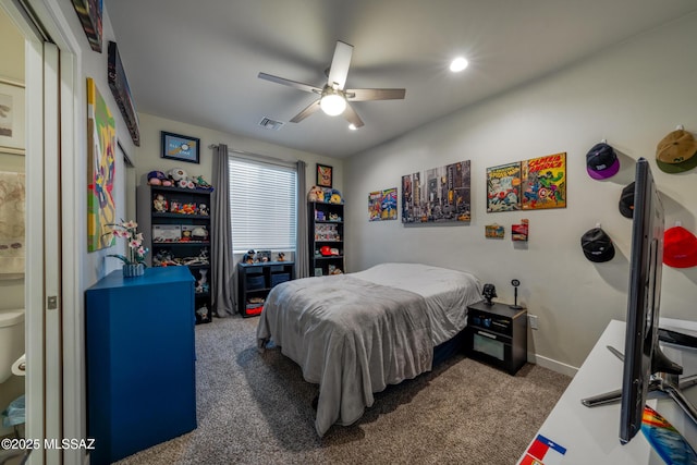 carpeted bedroom with ceiling fan, baseboards, and visible vents