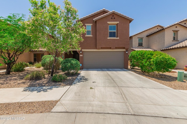 view of front of property with a garage