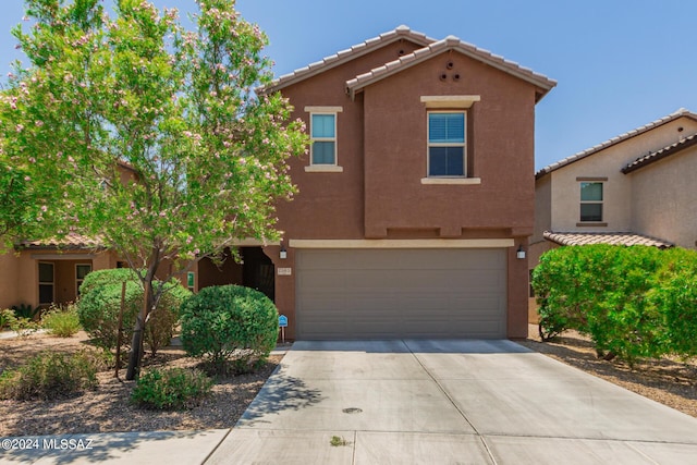 view of front of property featuring a garage