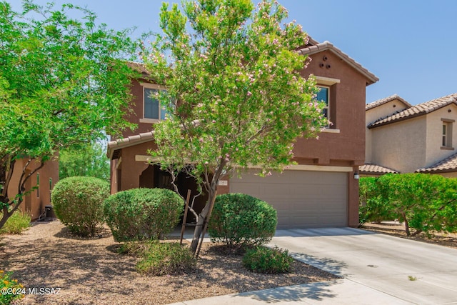 view of front of property featuring a garage