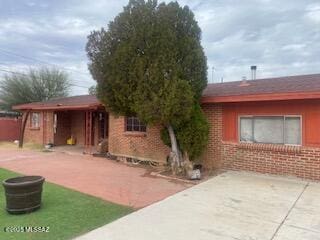 rear view of property with a patio area