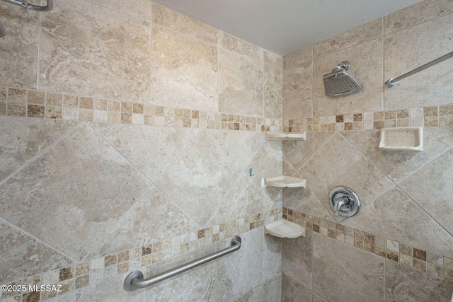 details featuring tiled shower