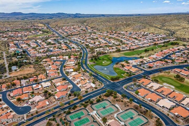 bird's eye view with a residential view and a water and mountain view