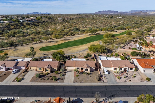 birds eye view of property featuring a mountain view