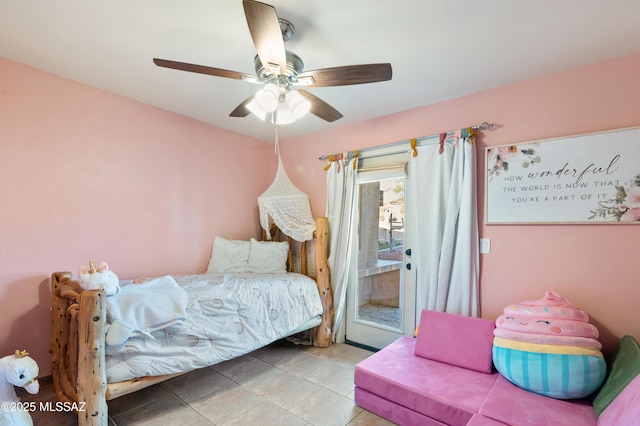 bedroom featuring access to outside, light tile patterned flooring, and a ceiling fan